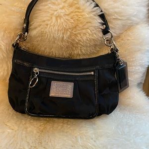 Coach small evening bag very nice and kept in great condition.